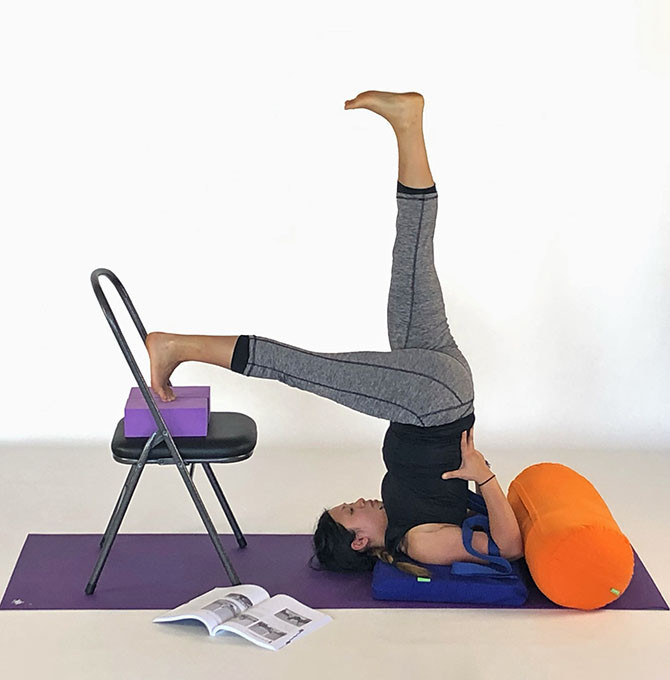 Premium Photo  Woman practicing advanced yoga on organic mat